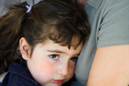 little girl holding mom